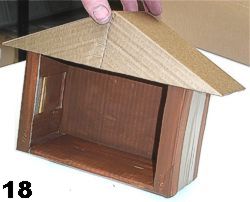 Put finished roof on main stable body. Now you can decorate and paint it to complete it.
