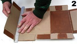 Use a metal ruler to help fold the cardboard neatly